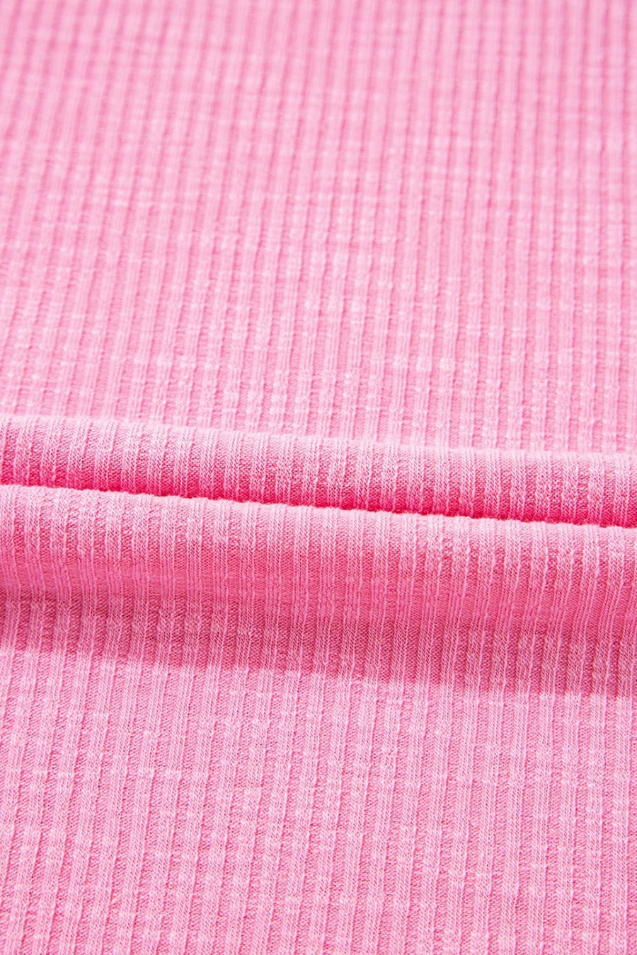 Pink ribbed knit blouse with pastel stripe sleeves