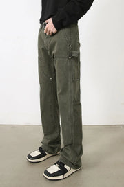 Army green utility jeans with wide legs and multiple pockets.