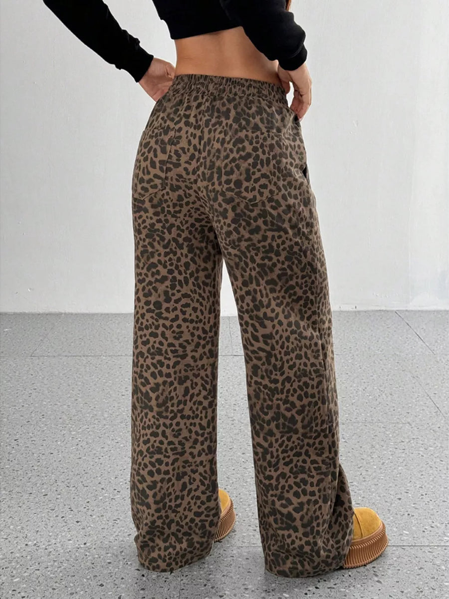 wide-leg pants in black with leopard-print and drawstring waist