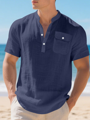 Navy blue cotton band-collar short-sleeve shirt with button-down placket and chest pocket.