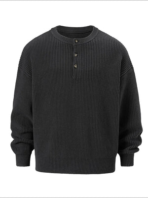 Dark gray ribbed knit henley sweater with button placket and oversized fit.