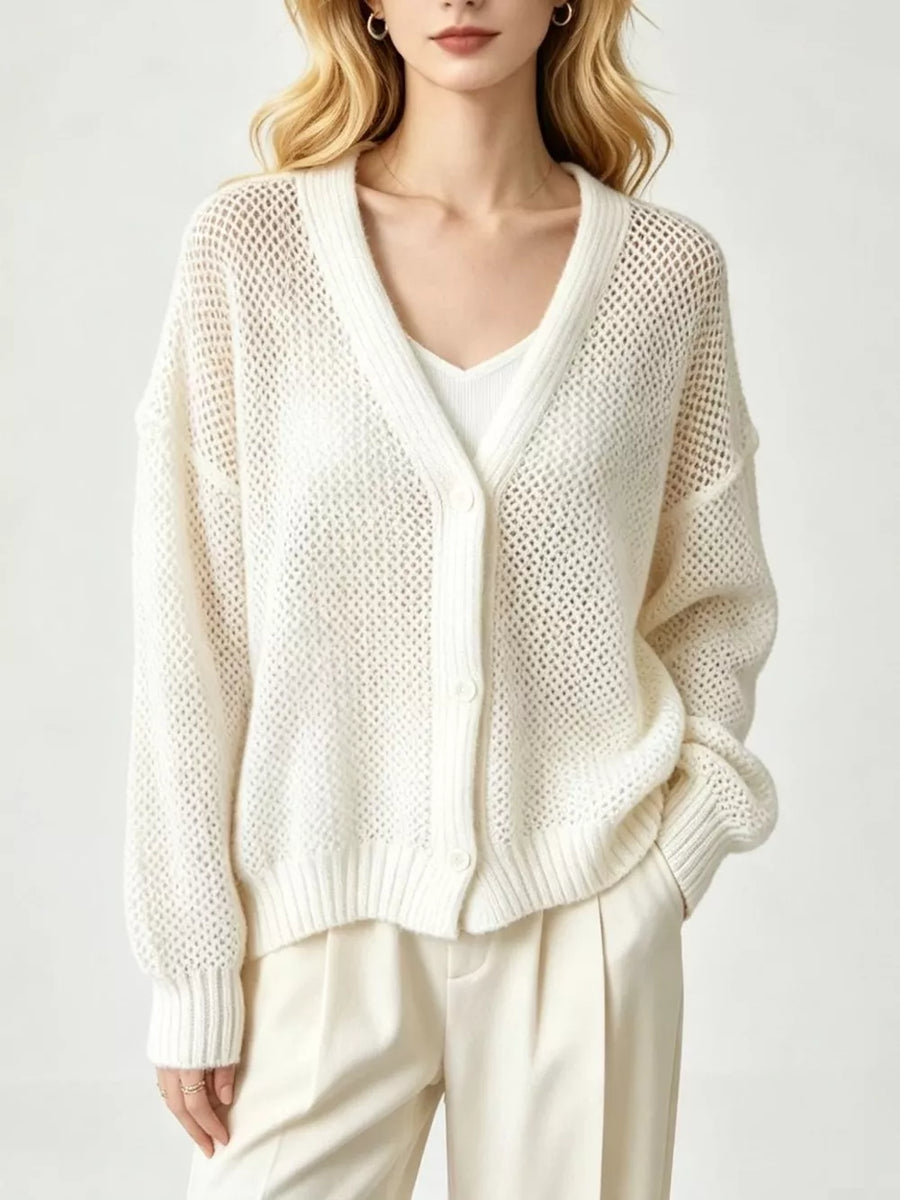 White cardigan featuring open-knit and open-knit