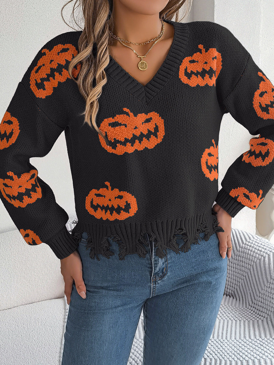 pullover sweater in Black with raw hem and cropped