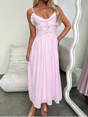 Pink ruffled midi dress with spaghetti straps and tie front