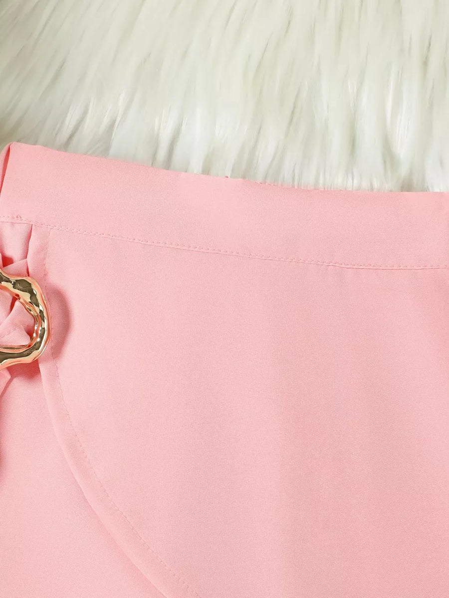 Toddler skort in White Powder with gold buckle detail.