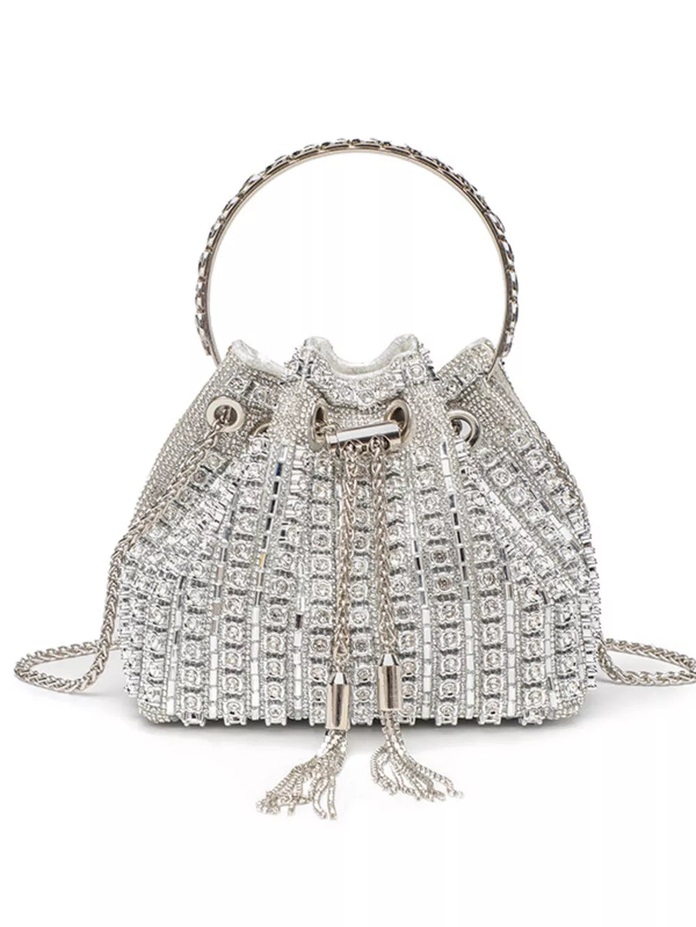 Silver rhinestone embellished mini crossbody bucket bag with chain strap and tassels.