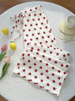 white pants with star-print and N/A