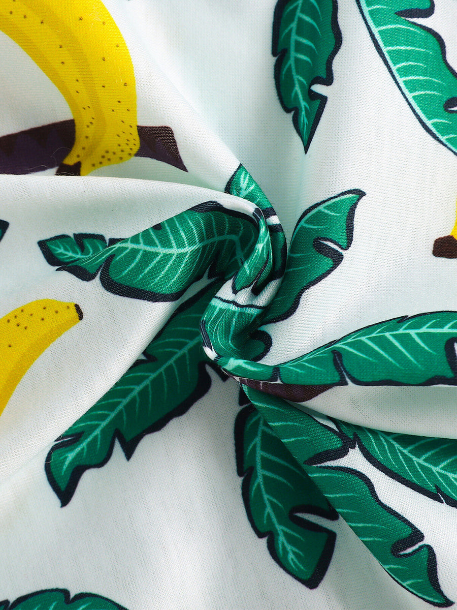 Baby set with tropical palm and banana print in white cotton, featuring a drawstring detail.