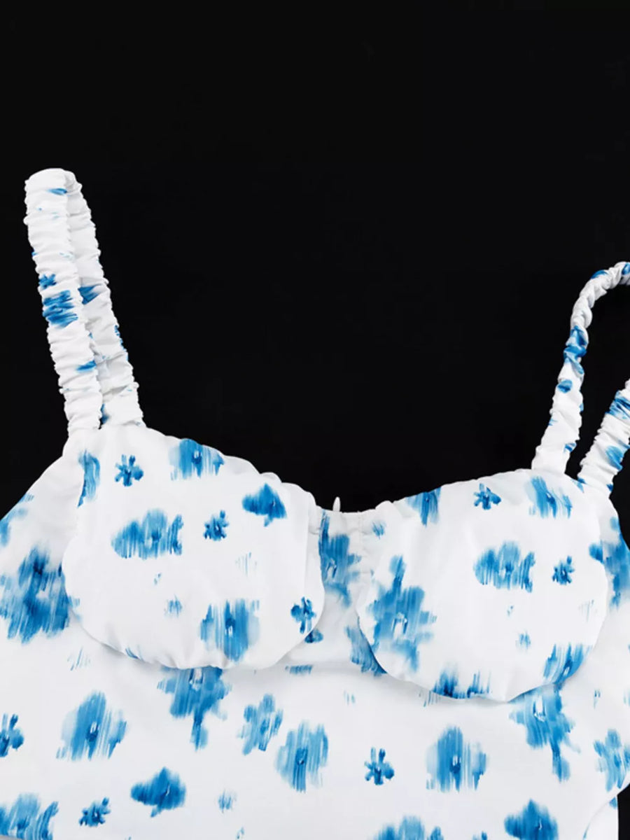 White cami with blue abstract floral print and ruched straps