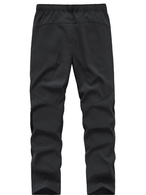 Black men's sweatpants with elastic waistband and paneled legs.