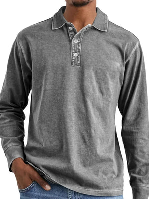 Vintage wash long-sleeve polo shirt in dark gray with button placket.