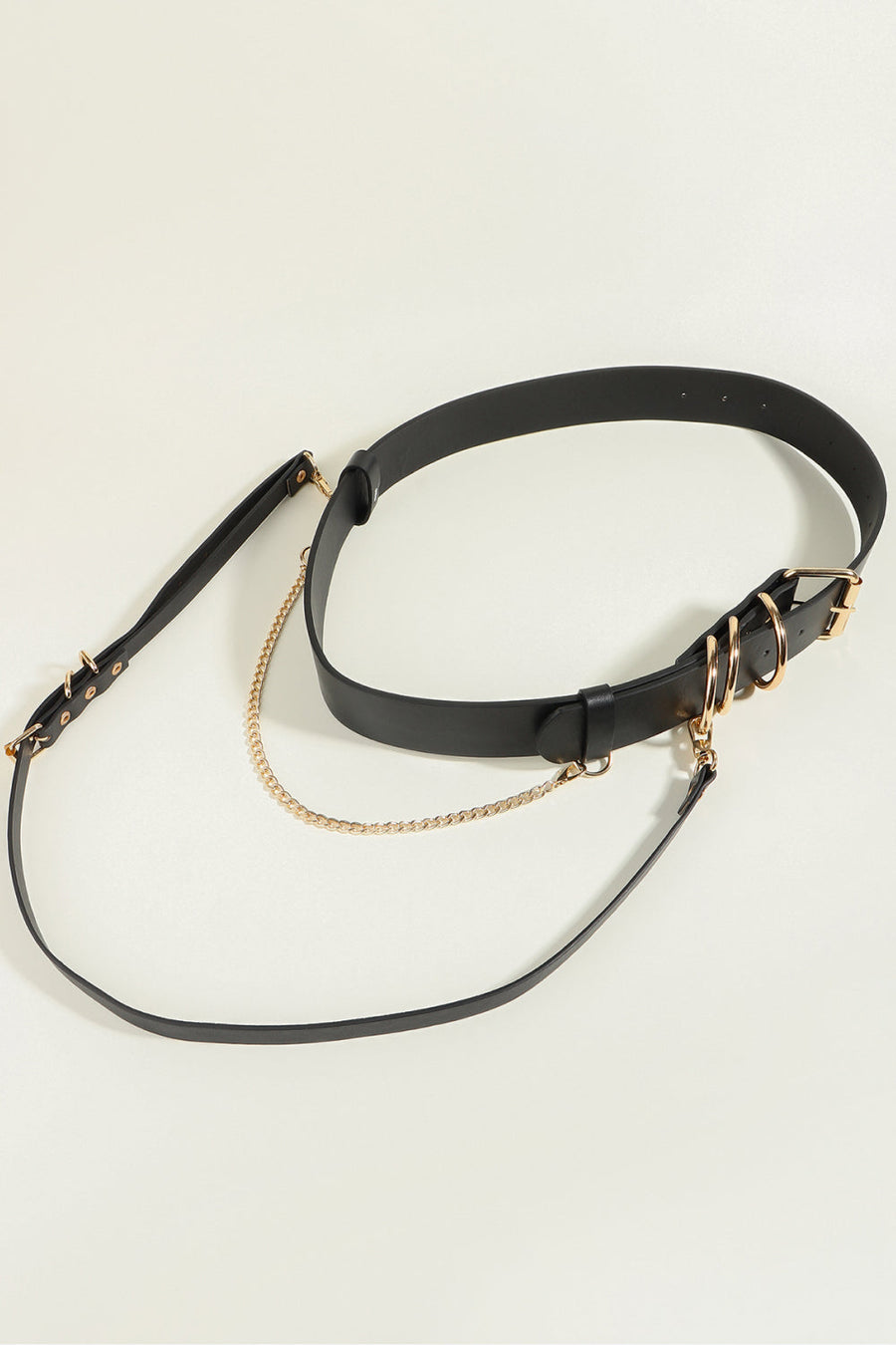 Black PU leather harness belt with gold chain detail and multiple rings