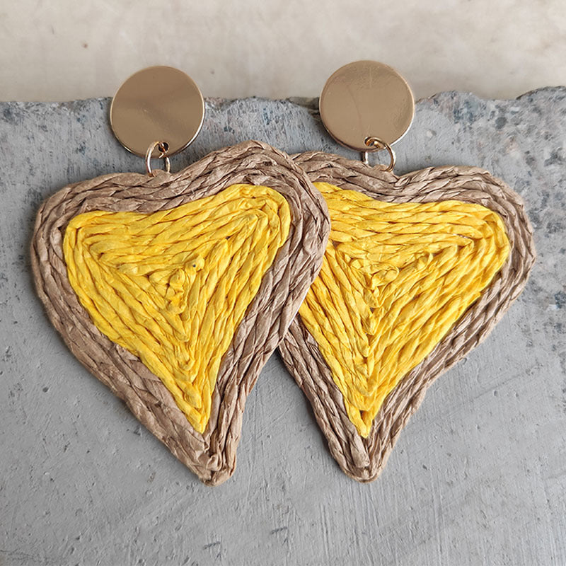Yellow woven heart statement earrings with gold stud detail
