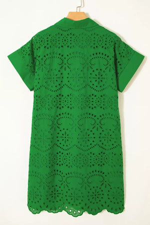 Green cotton eyelet collared dress with short sleeves and scalloped hem.
