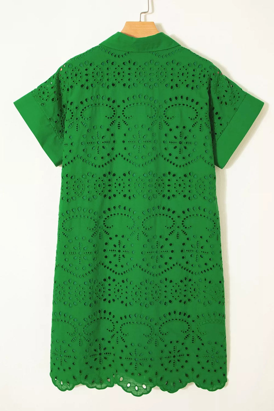 Green cotton eyelet collared dress with short sleeves and scalloped hem.