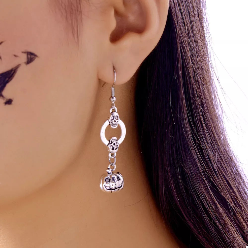 earrings in silver featuring dangle and dangle fit