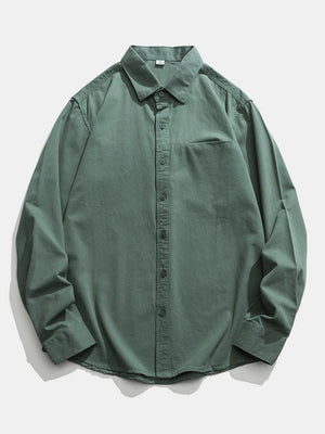 Men's green cotton button-down shirt with chest pocket and classic collar.