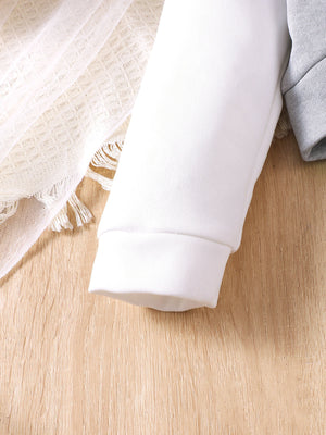 light gray hoodie and skirt set with cropped and pullover