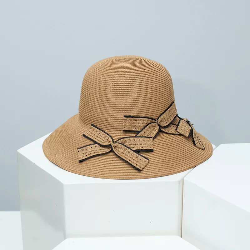 Chic straw sun hat in Khaki with decorative bowknot details.