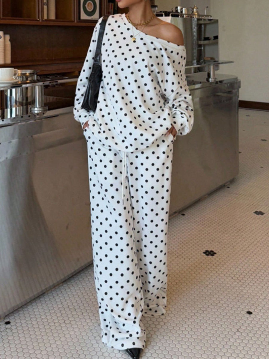 black pajama set featuring oversized and polka dot