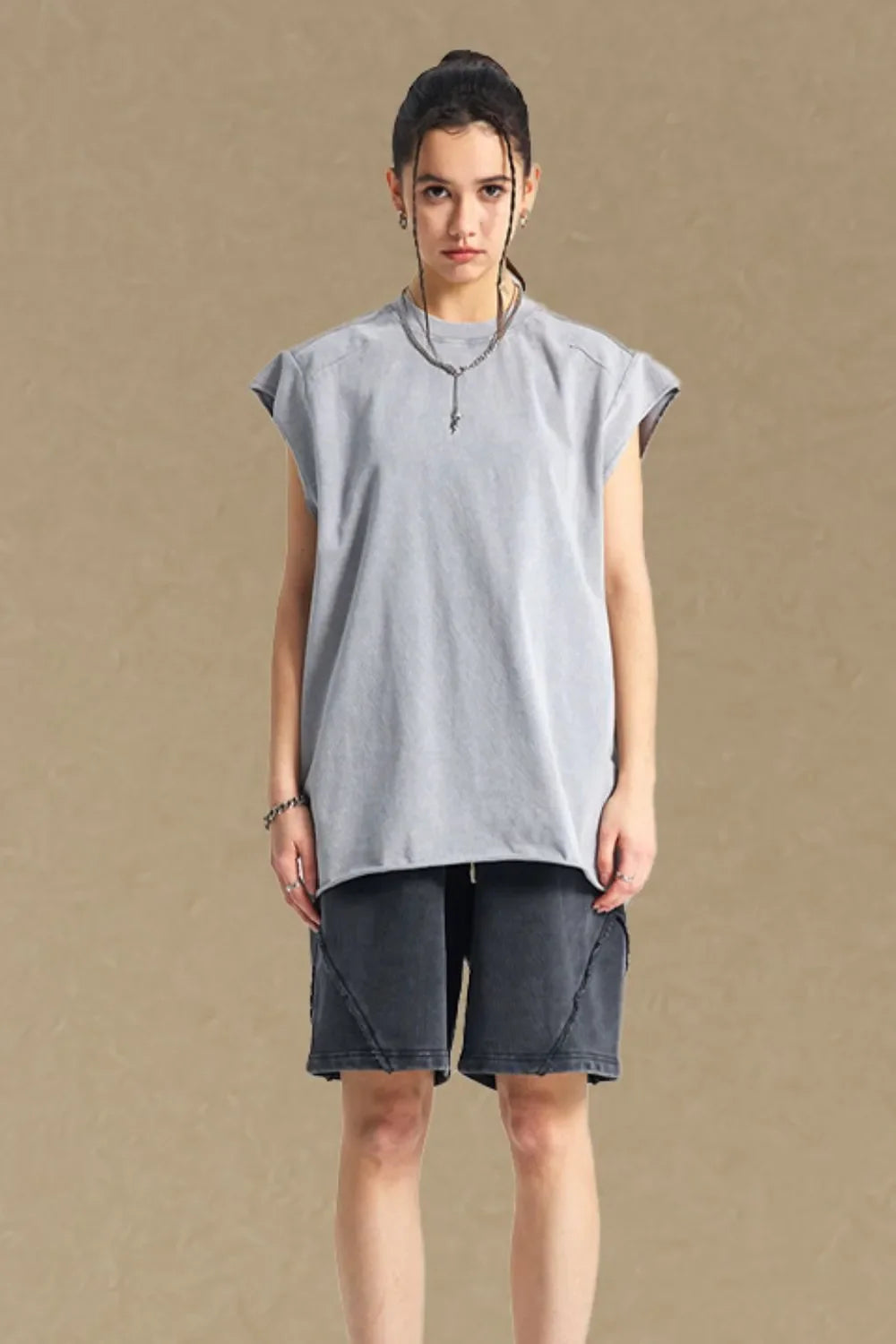 Gray raw edge muscle tank top with a crew neck and short sleeves.