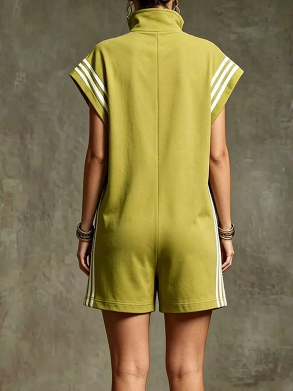 Sporty olive green zip-up romper with white stripe details on sleeves and sides.