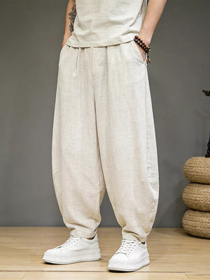 Men's ivory relaxed fit sweatpants with pockets and a casual, comfortable style.