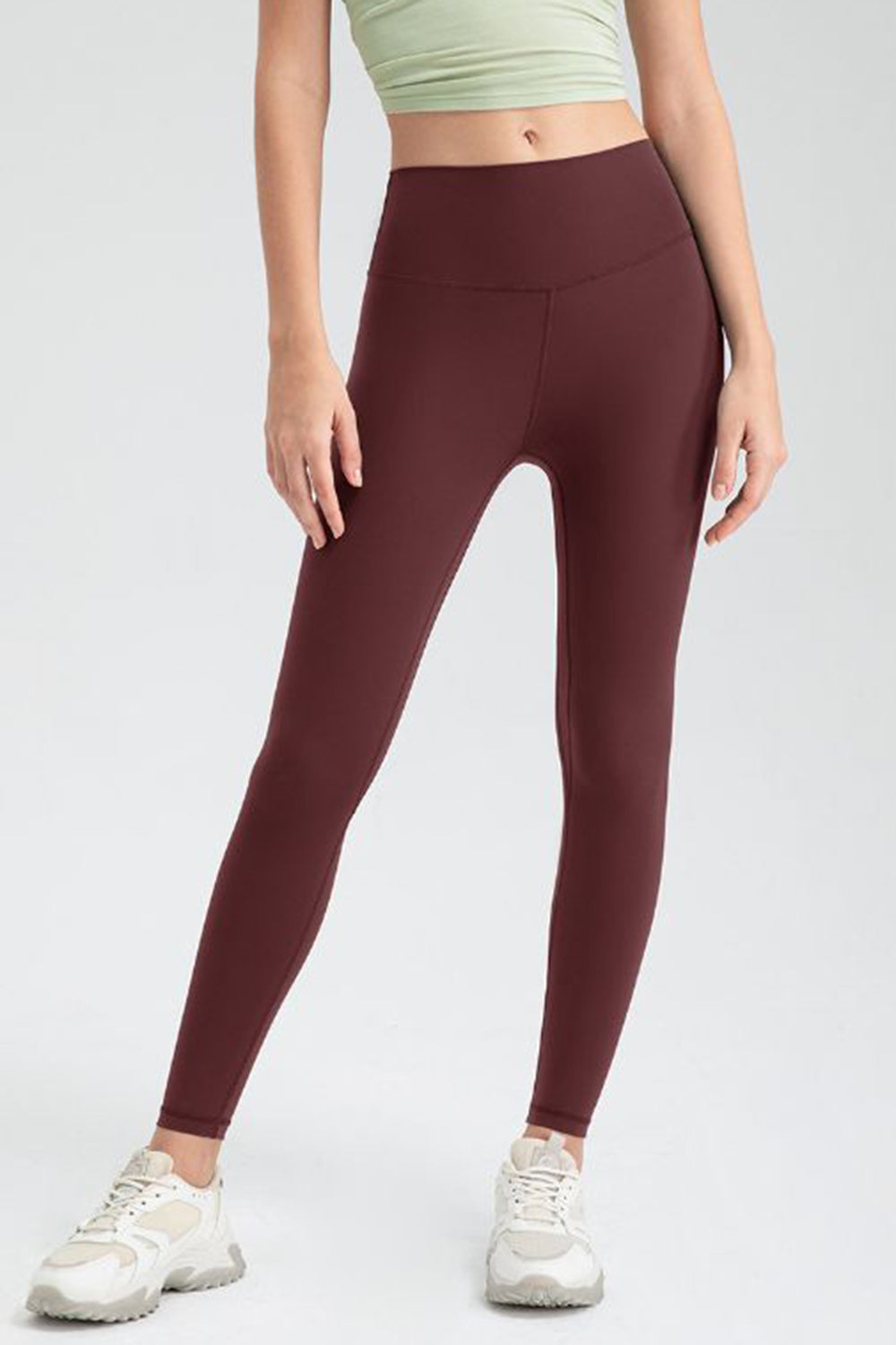 Sculpted seam high-waist performance leggings in wine.