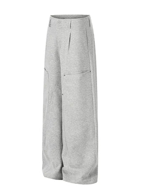 Gray wide-leg sweatpants with pleated front and cargo pockets.