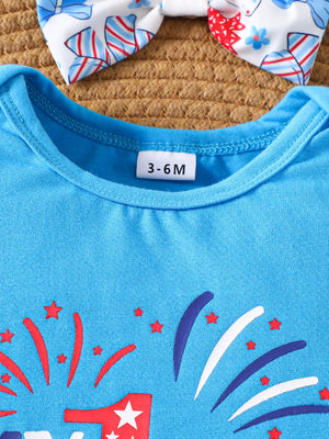 Blue cotton baby outfit with fireworks and stars print and matching bow headband.