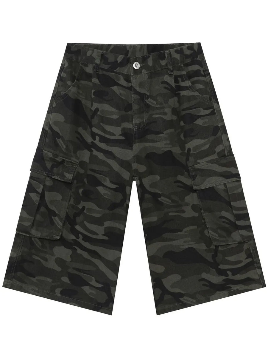 Pleated camo culotte cargo shorts in green camouflage with button closure and multiple pockets.