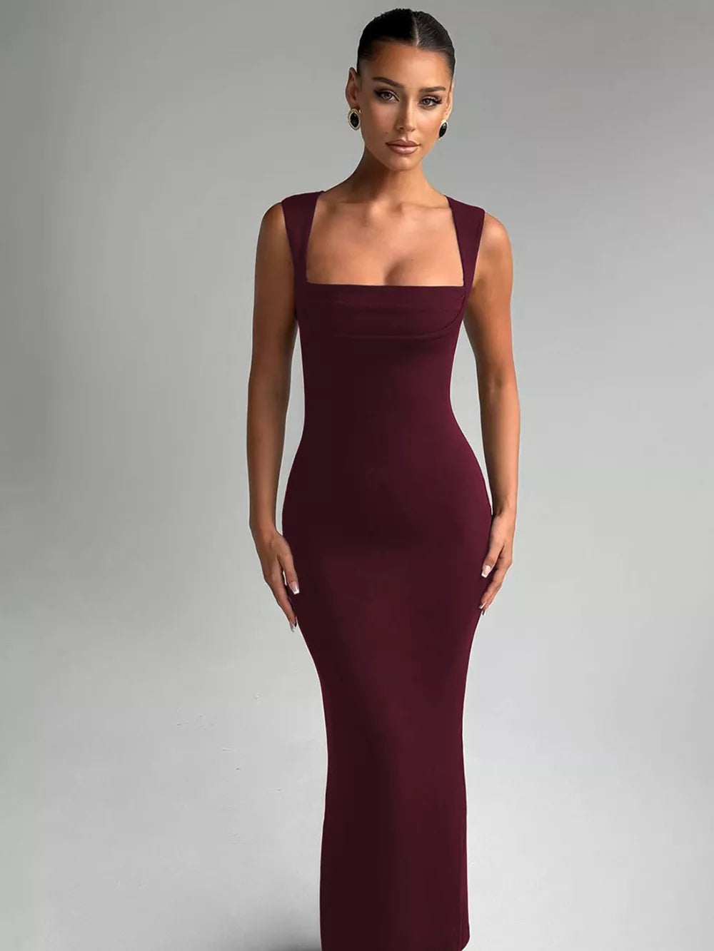 Wine red bodycon maxi dress with square neckline and sleeveless cut.