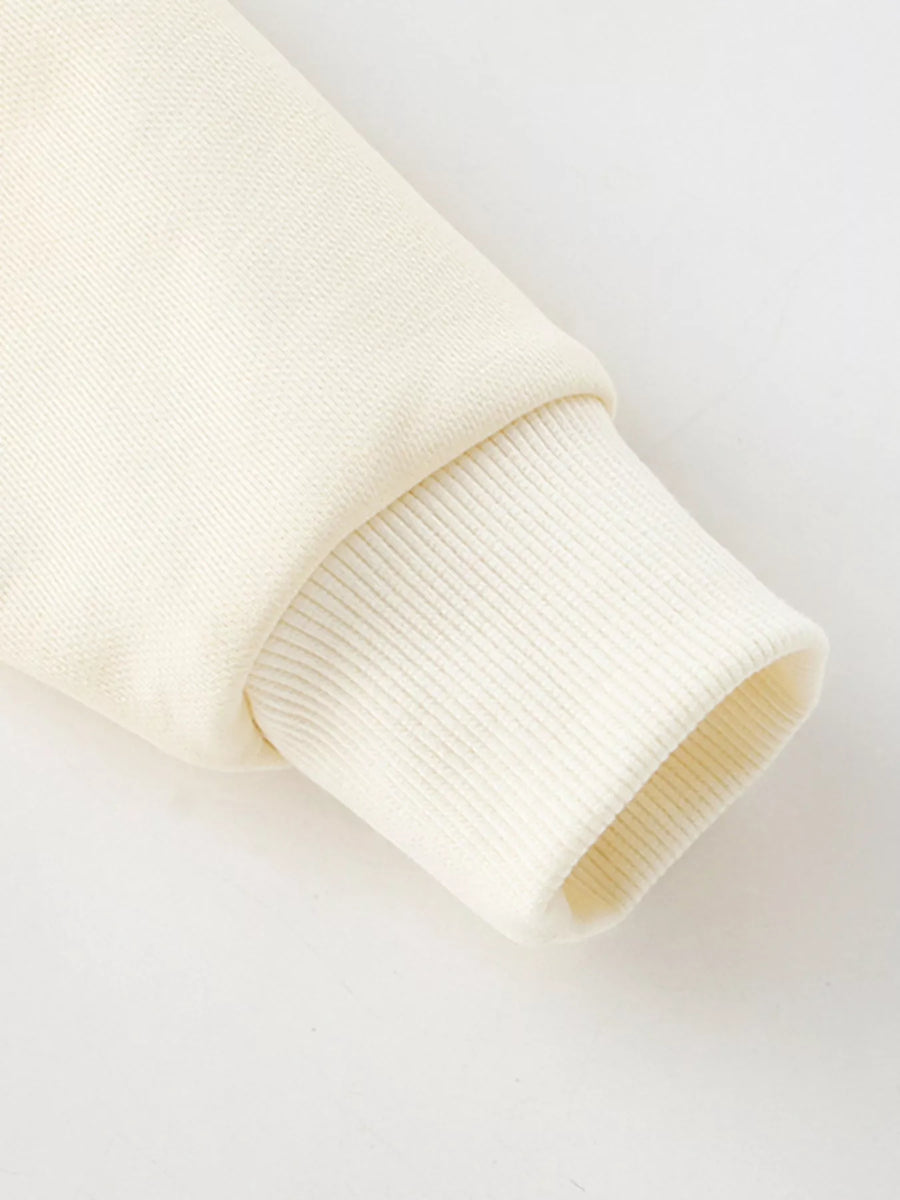 Cream cotton crew neck sweatshirt cuff detail