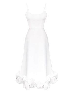 White midi dress with spaghetti straps and a ruffled hem detail.
