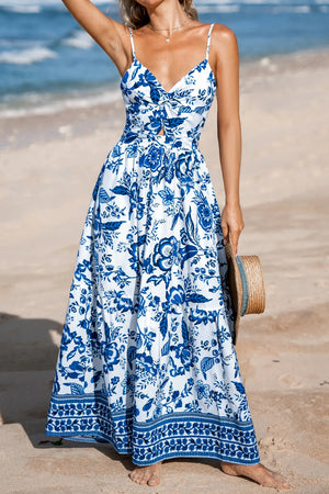Chinoiserie floral cutout maxi dress with tie-front bodice and tiered skirt.