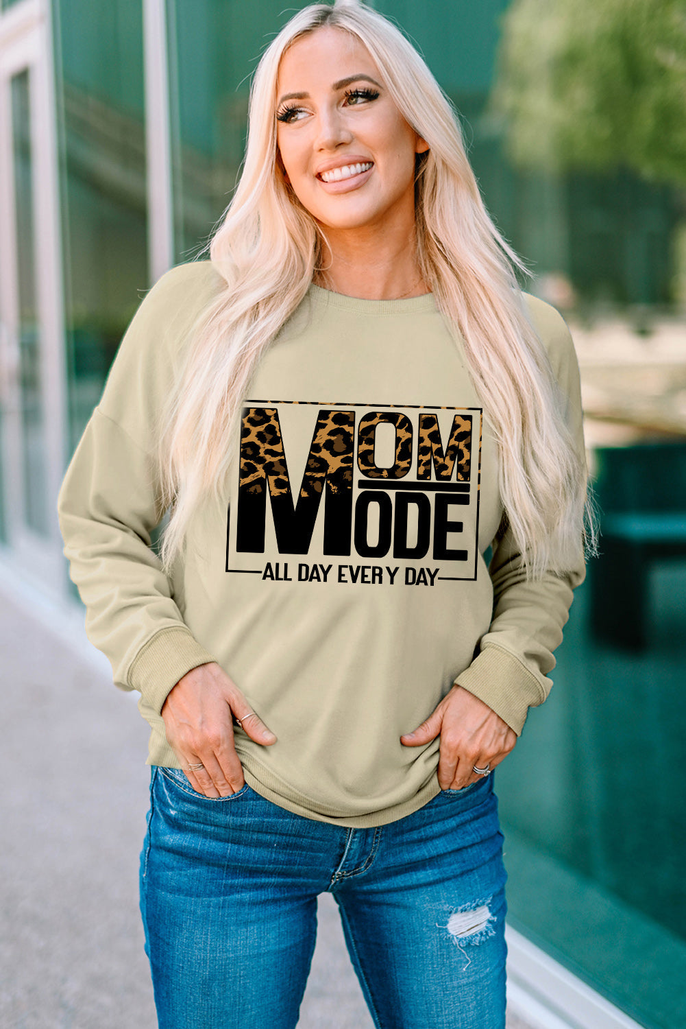 Khaki sweatshirt with leopard print MOM MODE graphic and casual crew neck.