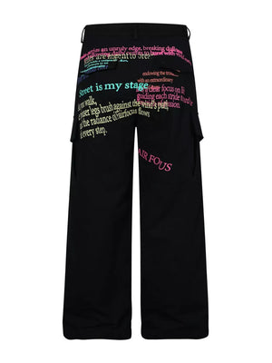 Black cargo pants with vibrant text print and side pockets.