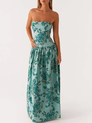 Turquoise floral print strapless maxi dress with a gathered waist and full skirt.