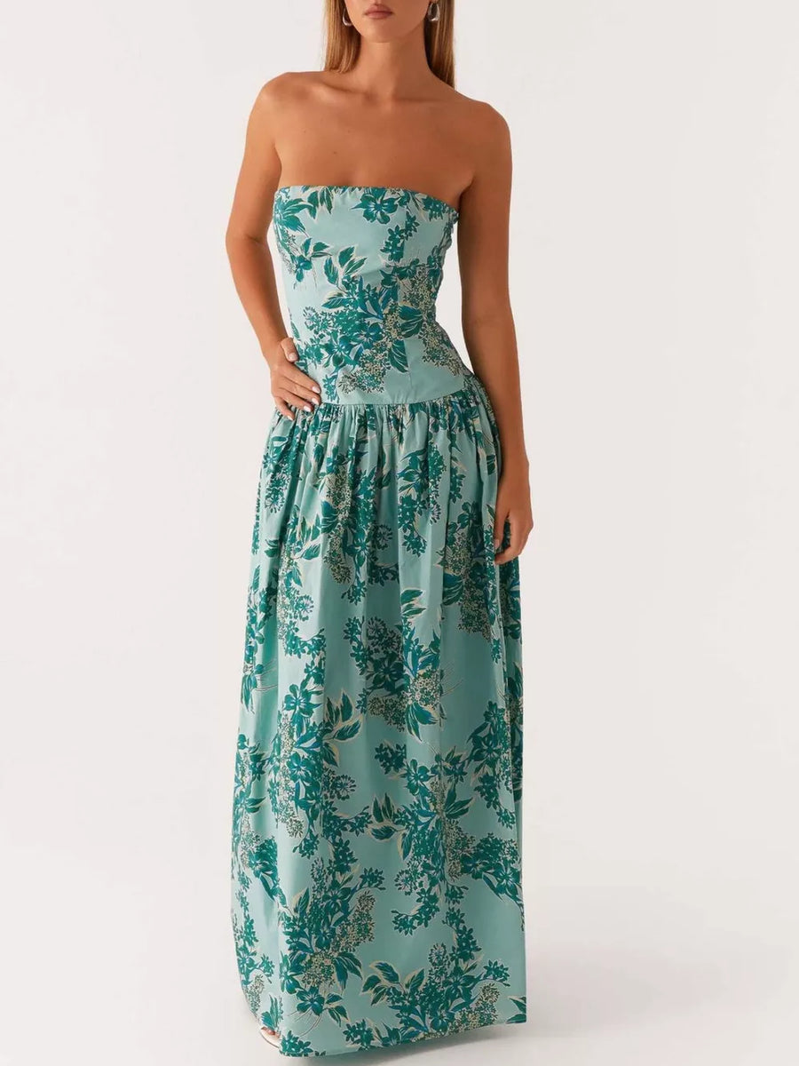 Turquoise floral print strapless maxi dress with a gathered waist and full skirt.