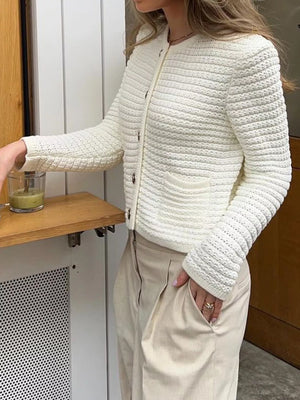 Textured button-down cardigan in gray/white with two front pockets and acrylic knit.