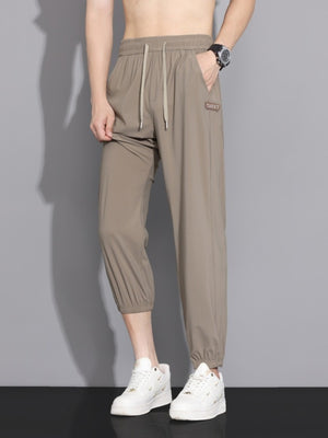 95%polyester,5%spandex Care instructions: Machine wash cold joggers in Khaki with loose silhouette