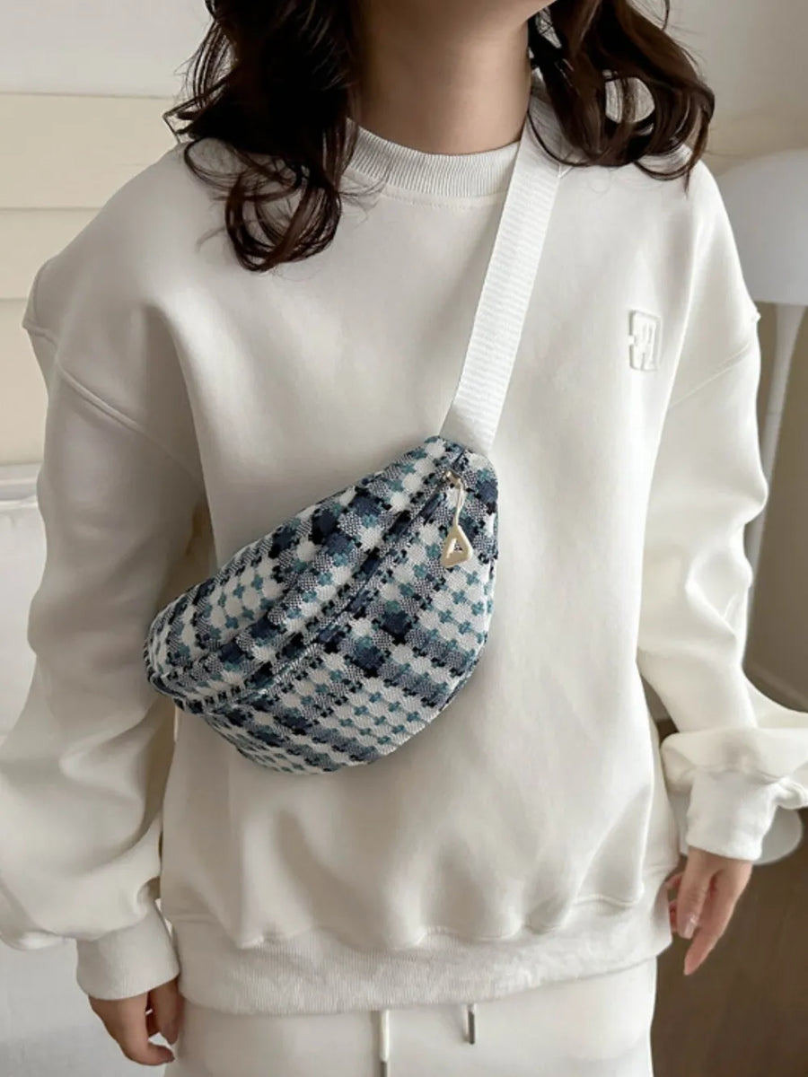 Textured houndstooth belt bag in French Blue with gold zipper detail
