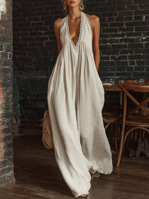 jumpsuit in light beige featuring lace trim and loose fit