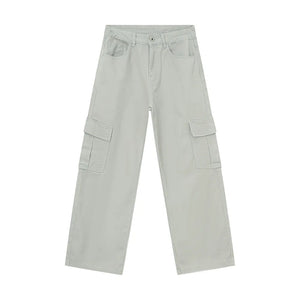 Oversized cargo denim trousers in eggshell with large side pockets and a relaxed fit.