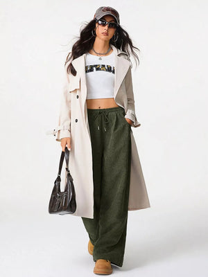Relaxed fit army green corduroy drawstring pants with a wide leg.