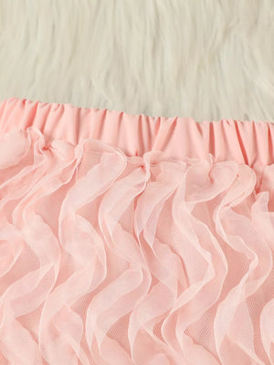 Pink toddler skirt with ruffled tulle overlay and elastic waistband