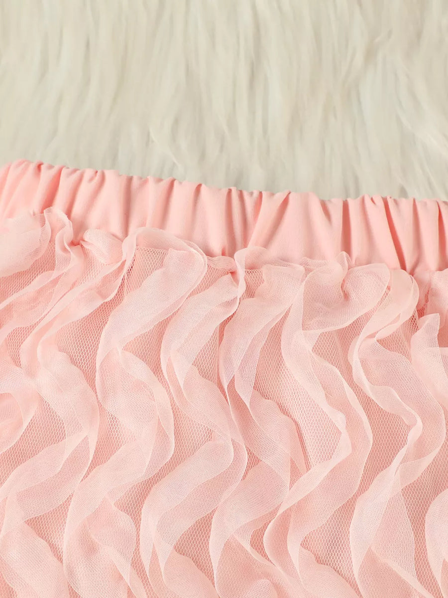 Pink toddler skirt with ruffled tulle overlay and elastic waistband