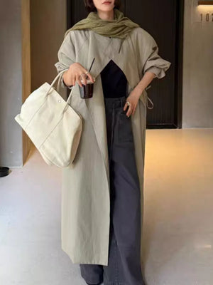 50% cotton, 50% brocade Care instructions: Machine wash cold trench coat in Moss with oversized silhouette