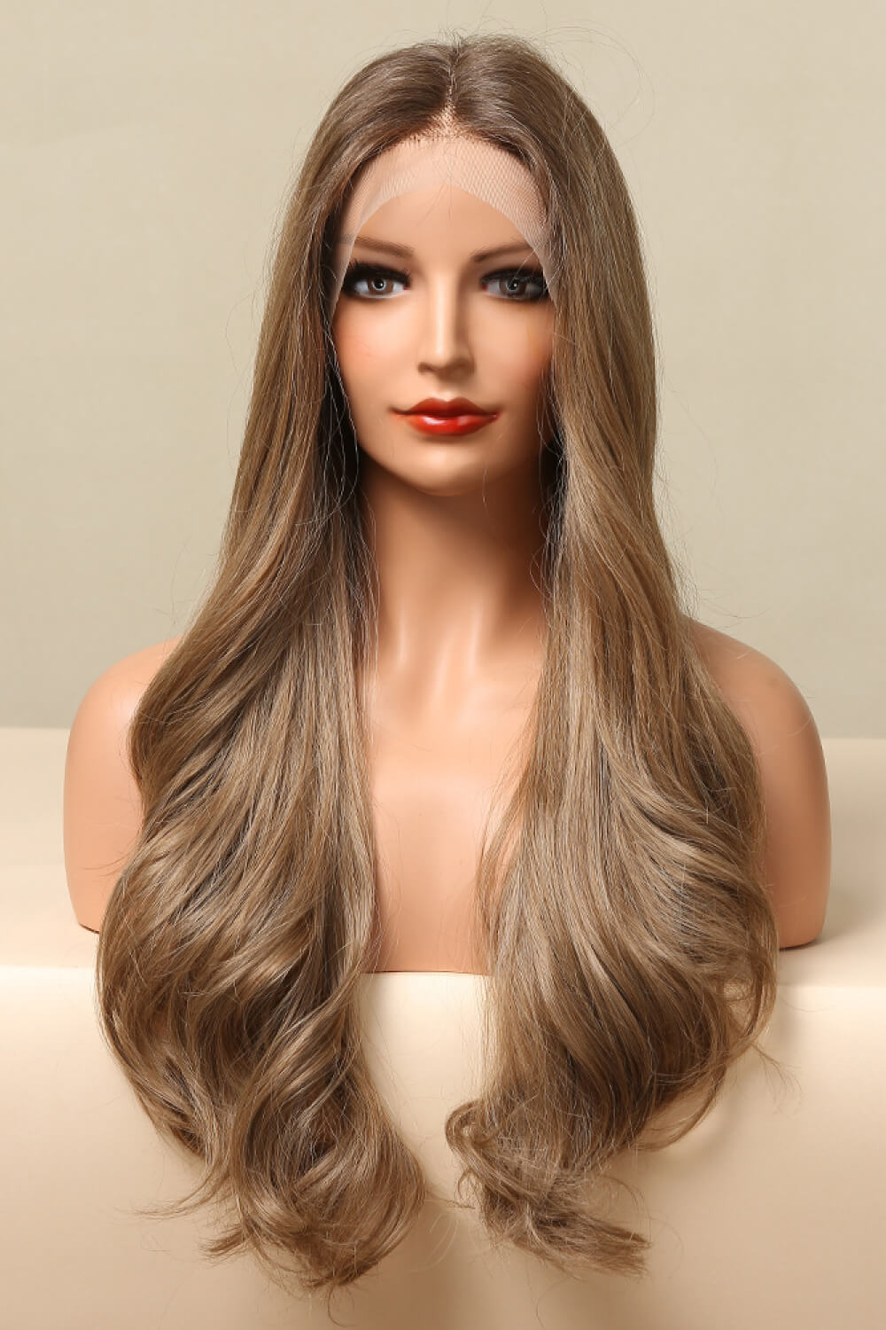 Luxe lace front wig in golden brown with cascading waves and a natural hairline.