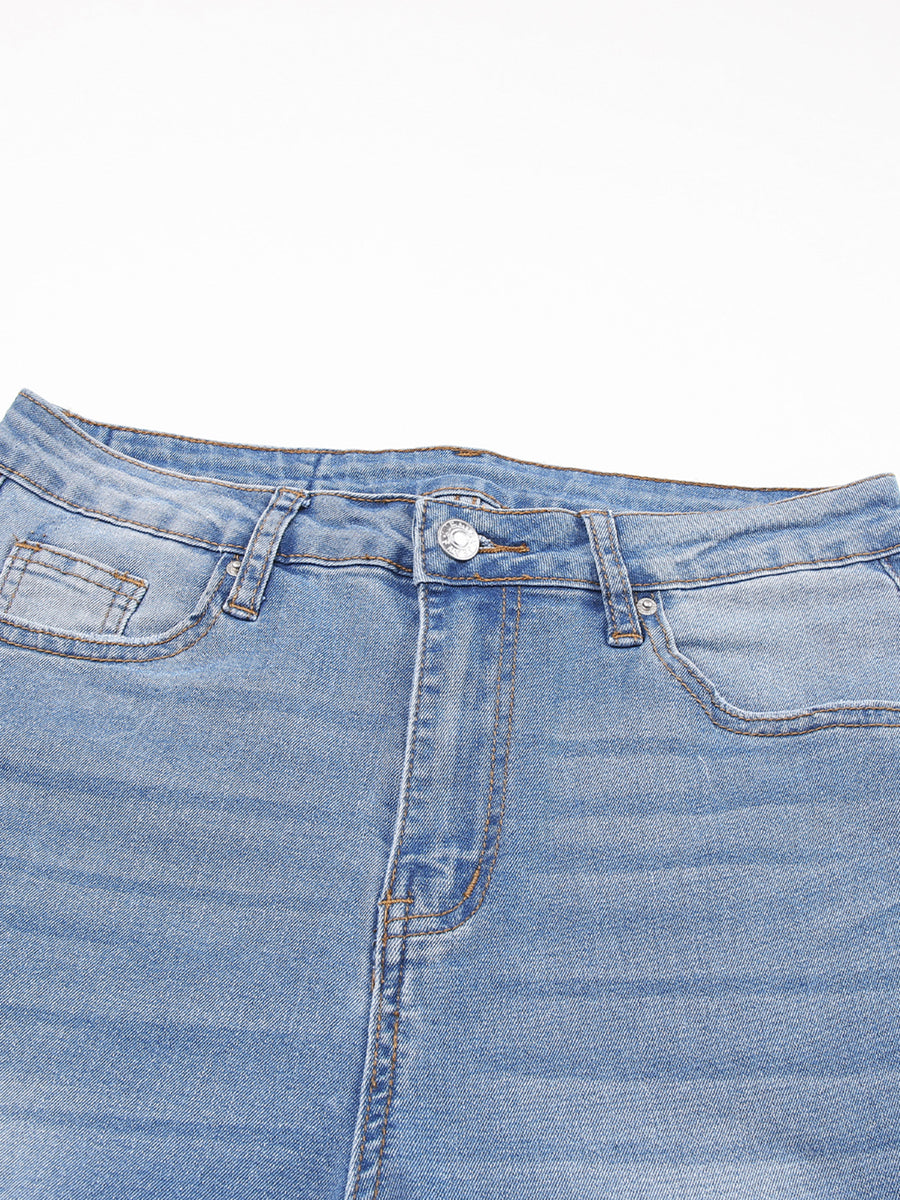 Light wash denim cropped jeans with whiskered details and five-pocket styling.